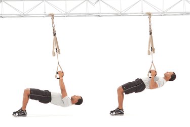 Man performing inverted row on the TRX Suspension Trainer
