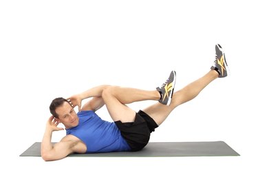 Man doing bicycle crunches to work his abs.