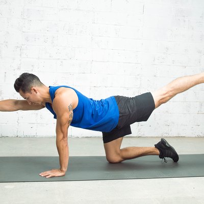 Blaine Strong doing the bird-dog exercise for the push-up challenge workout