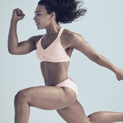 woman running in the athleta bra