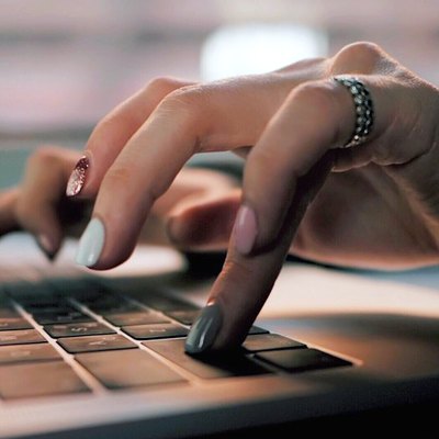 woman doing work at computer