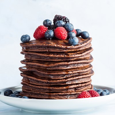 vegan chocolate pancakes with raspberries
