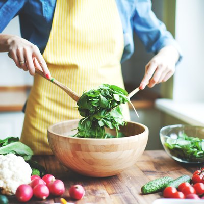 woman making a salad