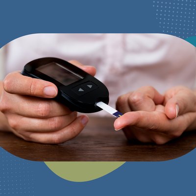 A person with type 2 diabetes testing her blood sugar with a glucometer