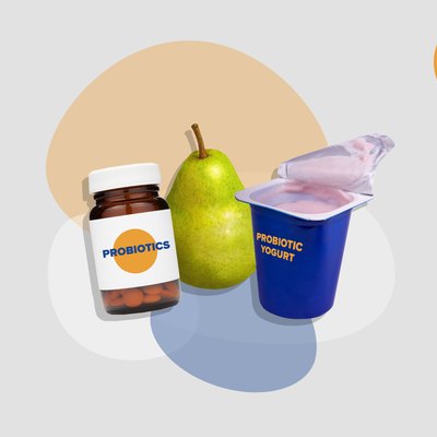 bottle of probiotics supplements, yogurt and pear on gray background with colorful shapes