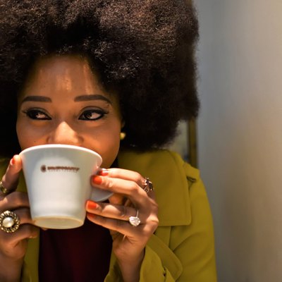 woman sipping coffee