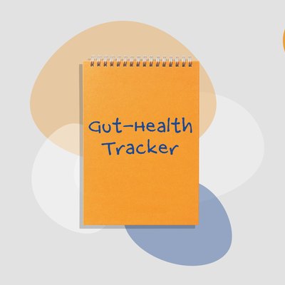 illustration of orange gut-health tracker notebook on gray background with colorful shapes