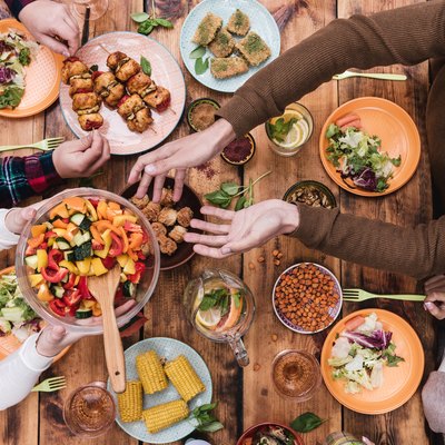 Friends having dinner for vegan nutrition on veganuary