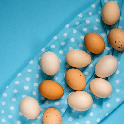 Eggs on a blue background, close-up.