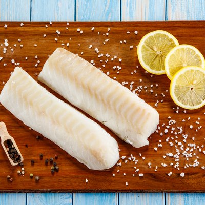 Fresh raw grouper fillet on cutting board
