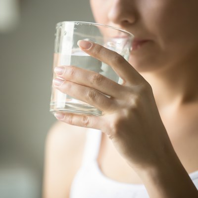 Female drinking from a glass of water