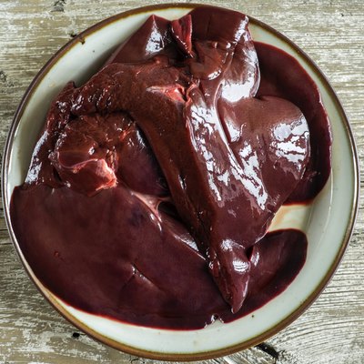 raw pork liver on a plate