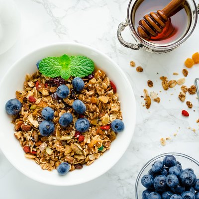 Bowl of homemade granola with yogurt