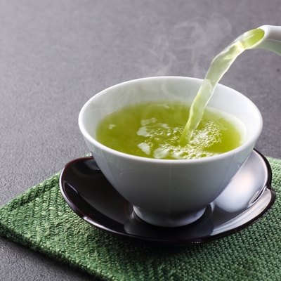 pouring green tea