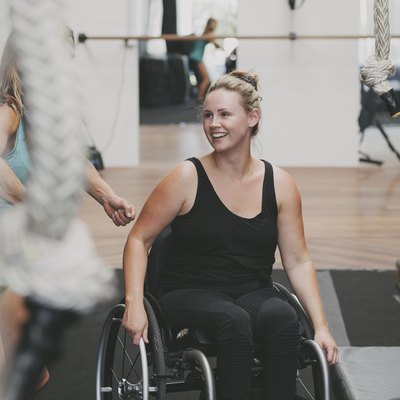 Paraplegic woman in a gym