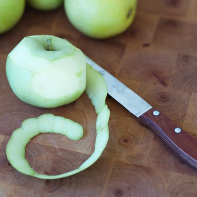 Partially peeled apple