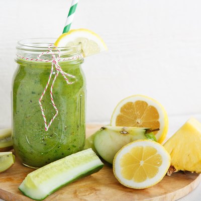 Fresh organic green smoothie with salad, apple, cucumber,