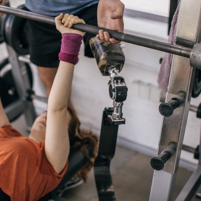 Couple exercising together in gym