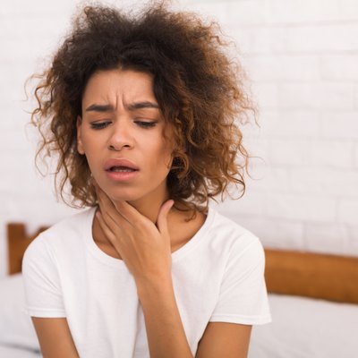 African-american woman with coughing