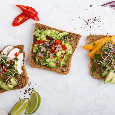 Plant based colorful vegan snack, variety of avocado toasts