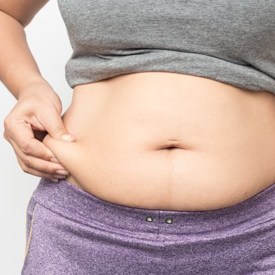 Woman feeling bloated.