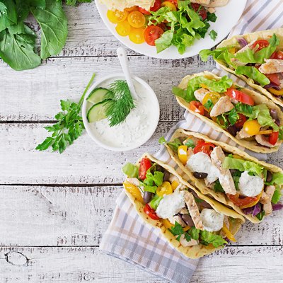 Mexican tacos with chicken, bell peppers, black beans