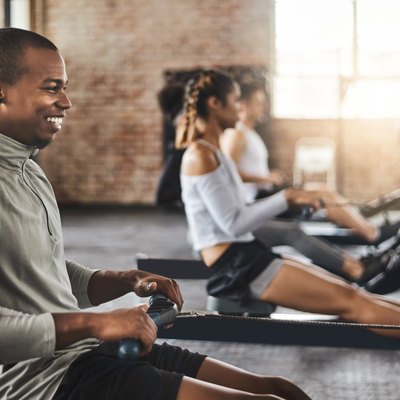 People in a rowing fitness class
