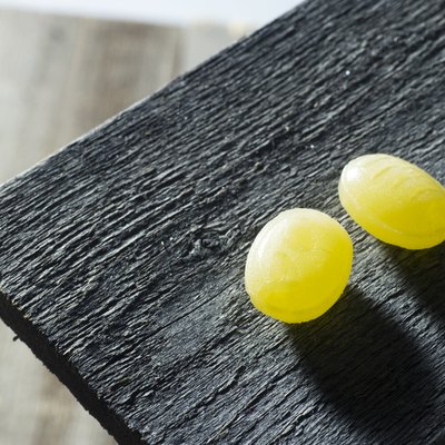 Cough Drops on Old Wooden Board