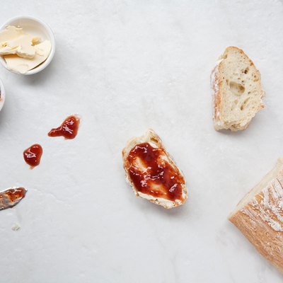 Flat lay of homemade french bread baguette sliced