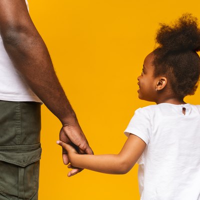 Father and daughter with normal resting heart rate for toddlers holding hands