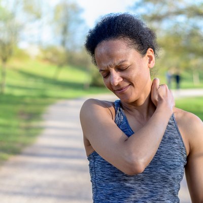 Woman with a pinched nerve in her neck