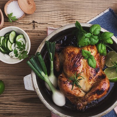 Roasted chicken with green vegetables salad and fresh herbs