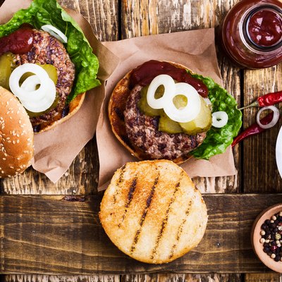 Homemade burgers with meat cutlet and pickles