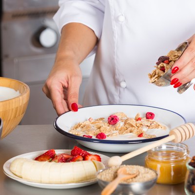 Midsection Of Chef Preparing Food In Commercial Kitchen for fiber and cholesterol