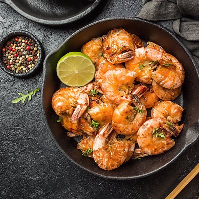 with lemon and thyme in a pan, top