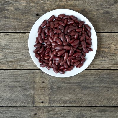 Directly Above Shot Of Kidney Beans In Plate On Wooden Table