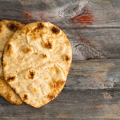 Simply delicious baked naan flatbreads on Picnic Table