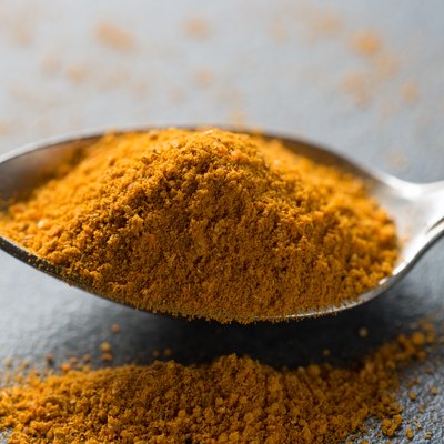 spoon of curry spice macro