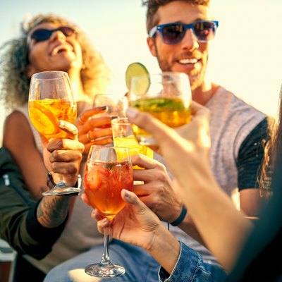 Friends with cold drinks in the summer