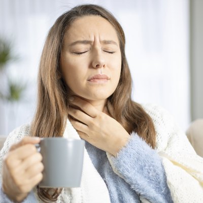 Young woman suffering from cold