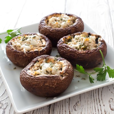 Mushrooms stuffed with cheese and greens