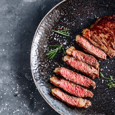 New York Striploin steak medium rare with rosemary top view