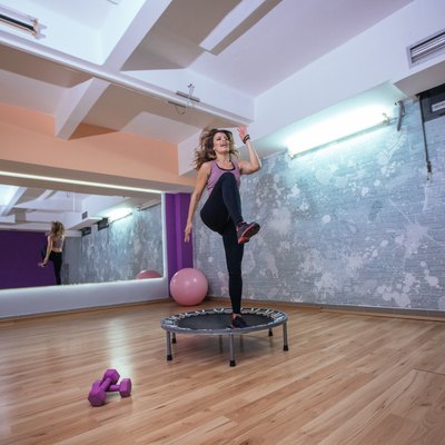 Girl training on trampoline