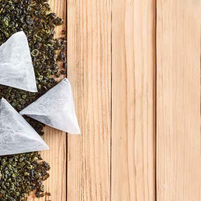 Tea in bags on the dried leaves of tea