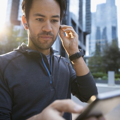 Man using fitness app to inspire friendly competition