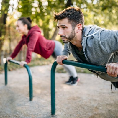 Couple working out together in the park