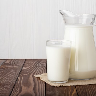 milk in glass and jug