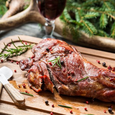 Closeup on chopping freshly baked venison
