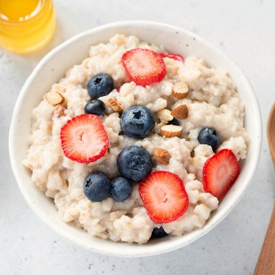 Oatmeal porridge with fresh berries in a bowl