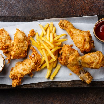 Fried breaded chicken legs with popular sauce